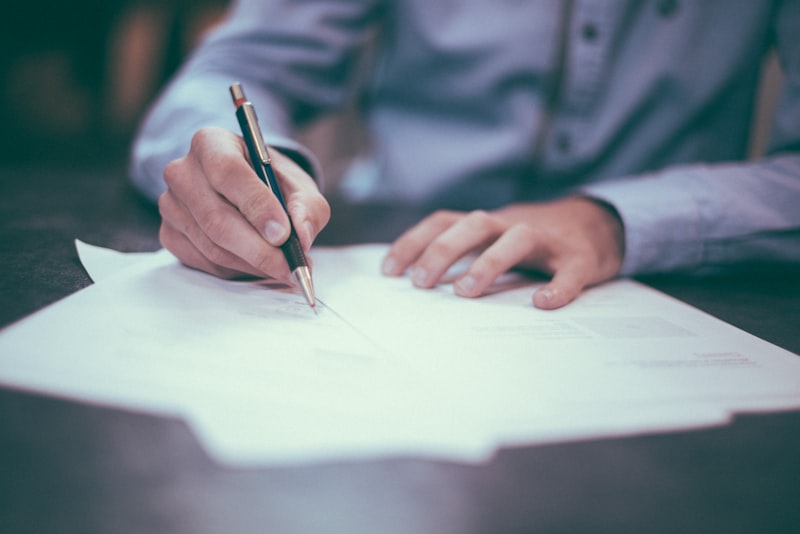 Salary and benefit documents on a desk
