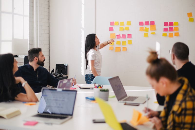 Government employees reviewing benefit information